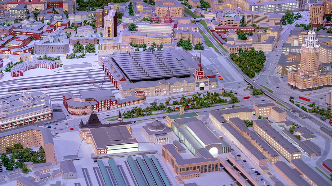 Three Moscow train stations, with another skyscraper visible on the right